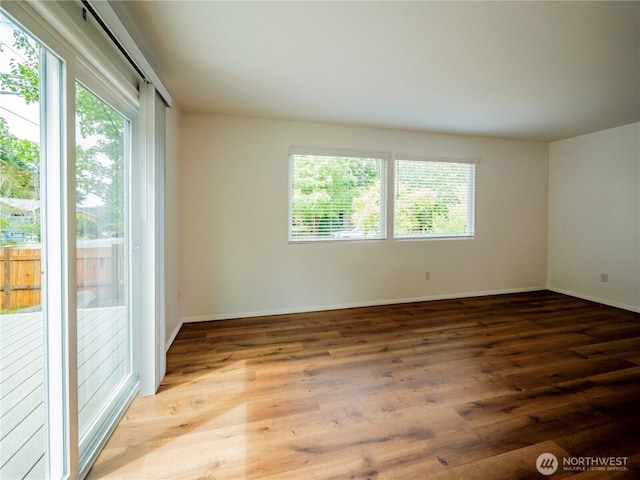1804 SE 10th Ave, Olympia, WA 98501 - unfurnished room with wood finished floors and baseboards