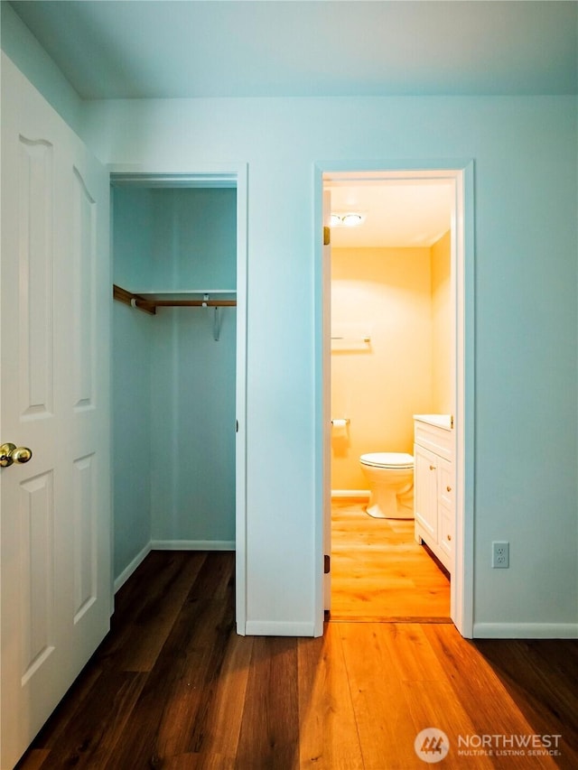 1804 SE 10th Ave, Olympia, WA 98501 - unfurnished bedroom with a closet, wood finished floors, and ensuite bath