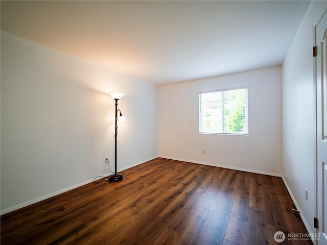 1804 SE 10th Ave, Olympia, WA 98501 - empty room featuring dark wood finished floors and baseboards