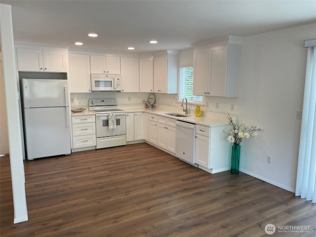 1804 SE 10th Ave, Olympia, WA 98501 - kitchen with white appliances, recessed lighting, white cabinetry, dark wood-type flooring, and light countertops