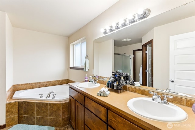 815 6th Ave SW, Olympia, WA 98512 - full bathroom with a garden tub, double vanity, and a shower stall
