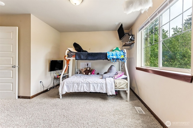 815 6th Ave SW, Olympia, WA 98512 - carpeted bedroom featuring baseboards