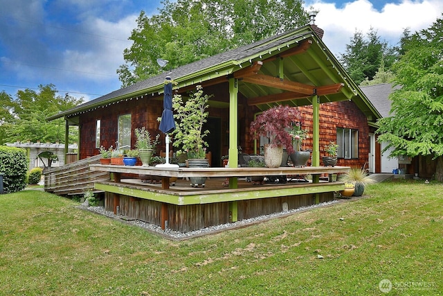 121 4th St, Langley, WA 98260 - surrounding community featuring a lawn and a deck