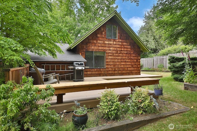 121 4th St, Langley, WA 98260 - rear view of house featuring a deck and a shingled roof