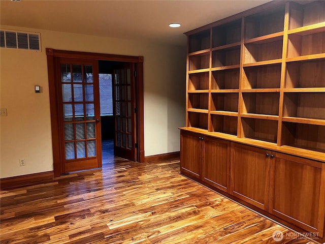 121 4th St, Langley, WA 98260 - spare room with wood finished floors and recessed lighting