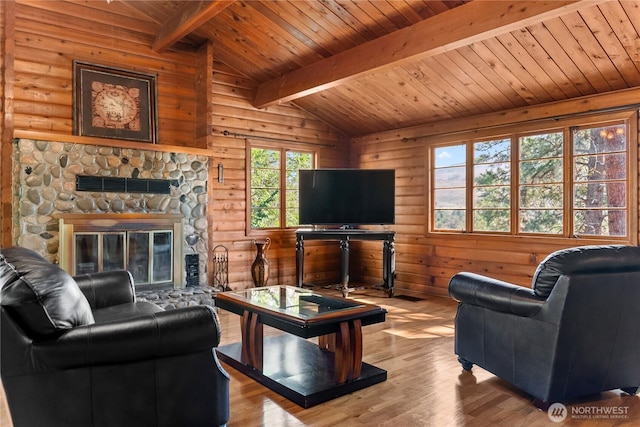 19834 State Route 20, Twisp, WA 98856 - living area with wooden ceiling, hardwood / wood-style flooring, wood walls, and a stone fireplace
