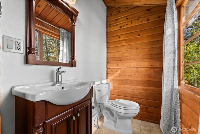 19834 State Route 20, Twisp, WA 98856 - bathroom featuring vanity, wood walls, tile patterned floors, and a shower with curtain