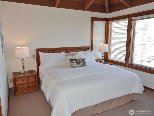 1407 Ocean Shores Blvd SW Unit 3N-H, Ocean Shores, WA 98569 - carpeted bedroom with beam ceiling and multiple windows