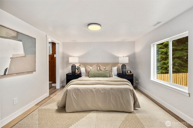840 NE 100th St Unit A, Seattle, WA 98125 - bedroom featuring wood finished floors