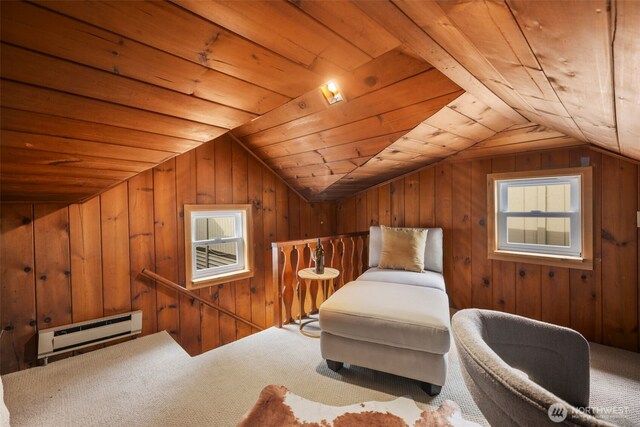 840 NE 100th St Unit A, Seattle, WA 98125 - sitting room with a baseboard radiator, an upstairs landing, vaulted ceiling, wood ceiling, and wood walls