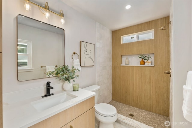 840 NE 100th St Unit A, Seattle, WA 98125 - bathroom featuring vanity and tiled shower