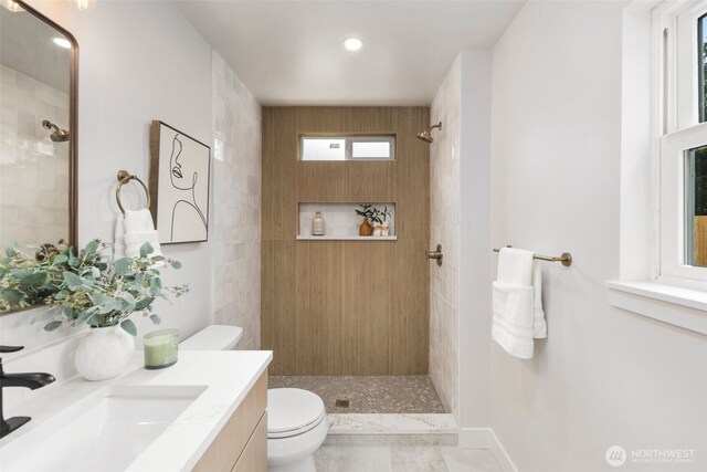 840 NE 100th St Unit A, Seattle, WA 98125 - full bathroom featuring tiled shower, vanity, and recessed lighting