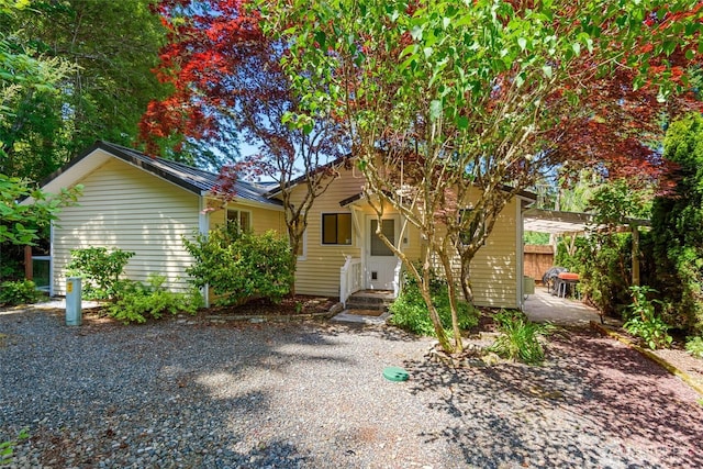 7717 176th Ave SW, Longbranch, WA 98351 - view of front of house with a patio