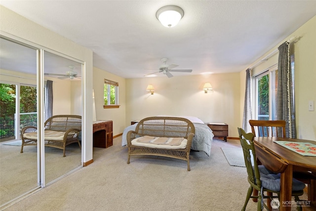 7717 176th Ave SW, Longbranch, WA 98351 - bedroom with light carpet and a ceiling fan