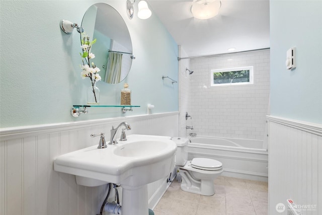 7717 176th Ave SW, Longbranch, WA 98351 - bathroom featuring shower / bath combination, wainscoting, and tile patterned flooring