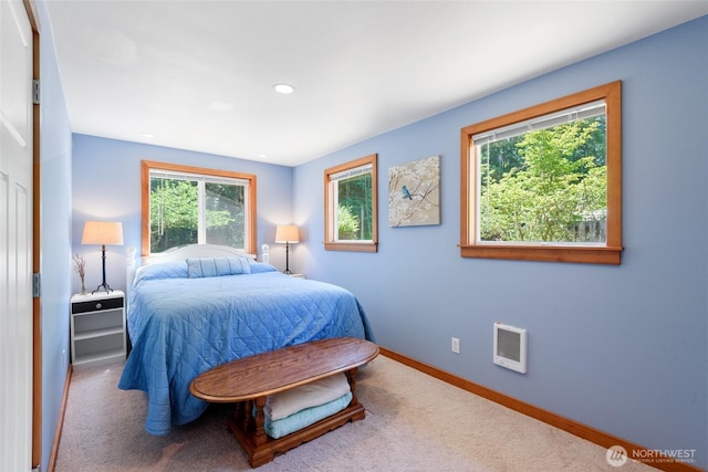 7717 176th Ave SW, Longbranch, WA 98351 - bedroom featuring multiple windows, carpet flooring, heating unit, and recessed lighting