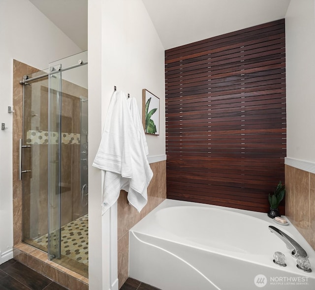 10113 SE 220th Pl, Kent, WA 98031 - bathroom featuring a bath and a stall shower