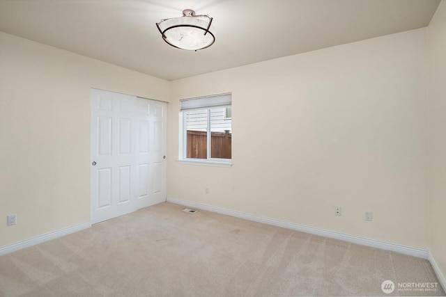 10113 SE 220th Pl, Kent, WA 98031 - unfurnished bedroom with light colored carpet and a closet