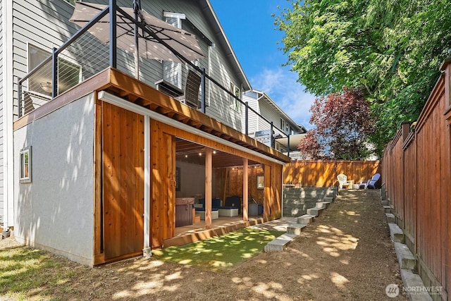 10113 SE 220th Pl, Kent, WA 98031 - view of home's exterior featuring a patio