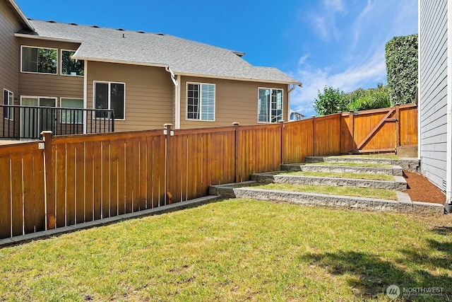 10113 SE 220th Pl, Kent, WA 98031 - fenced backyard with a vegetable garden
