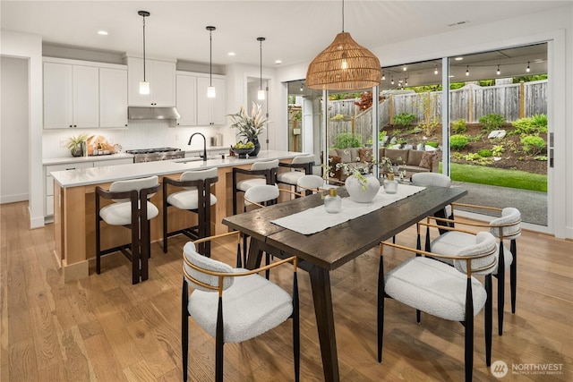 3052 SE 13th Pl, North Bend, WA 98045 - dining space featuring light wood-style floors and recessed lighting