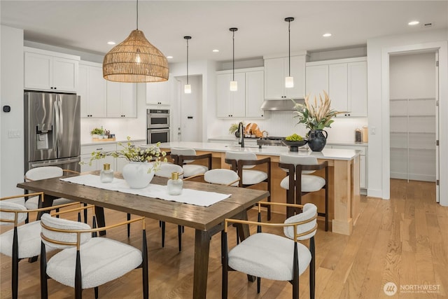 3052 SE 13th Pl, North Bend, WA 98045 - dining space with recessed lighting and light wood-type flooring