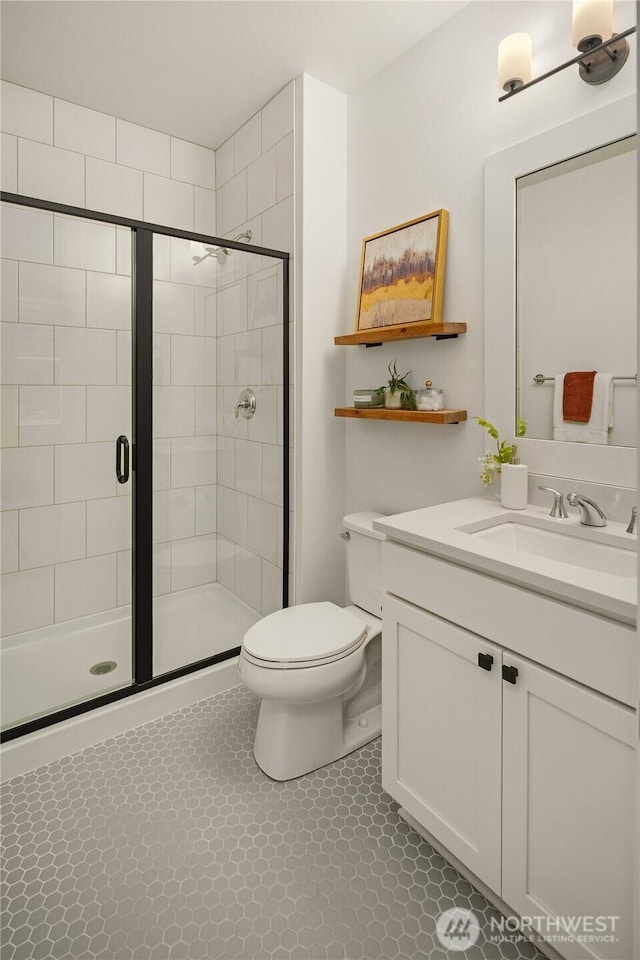 3052 SE 13th Pl, North Bend, WA 98045 - bathroom featuring vanity, a shower stall, and tile patterned flooring