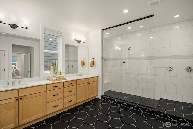 3052 SE 13th Pl, North Bend, WA 98045 - full bath with tile patterned flooring, double vanity, a walk in shower, recessed lighting, and ensuite bathroom