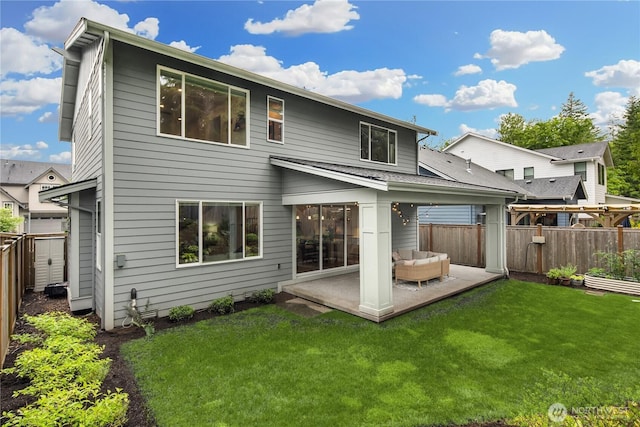 3052 SE 13th Pl, North Bend, WA 98045 - back of house with a patio area, a fenced backyard, and an outdoor living space