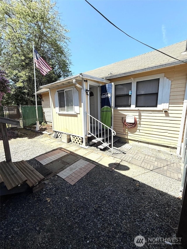 2521 Walnut St, Everett, WA 98201 - rear view of house featuring a patio area and a shingled roof