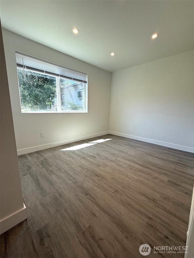 2521 Walnut St, Everett, WA 98201 - empty room with dark wood-style floors and recessed lighting