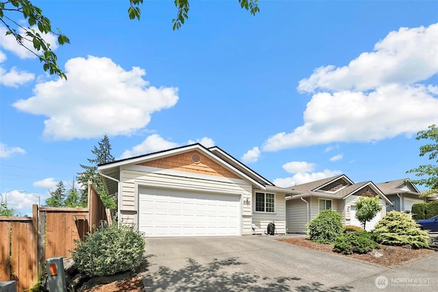 8506 8th Ct SE, Olympia, WA 98513 - ranch-style home featuring concrete driveway and an attached garage