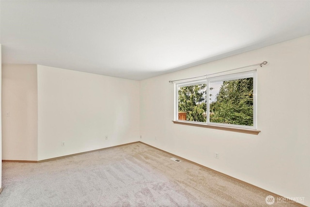 8506 8th Ct SE, Olympia, WA 98513 - carpeted empty room featuring baseboards