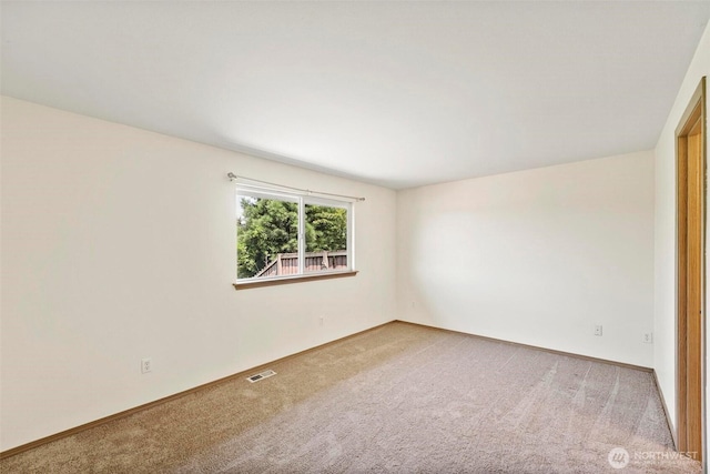 8506 8th Ct SE, Olympia, WA 98513 - carpeted empty room featuring baseboards