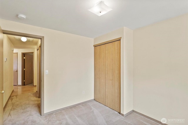 8506 8th Ct SE, Olympia, WA 98513 - unfurnished bedroom with light carpet and a closet