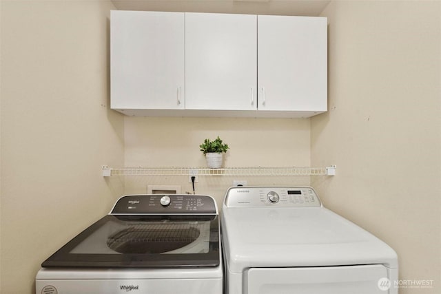 8506 8th Ct SE, Olympia, WA 98513 - washroom featuring cabinet space and independent washer and dryer