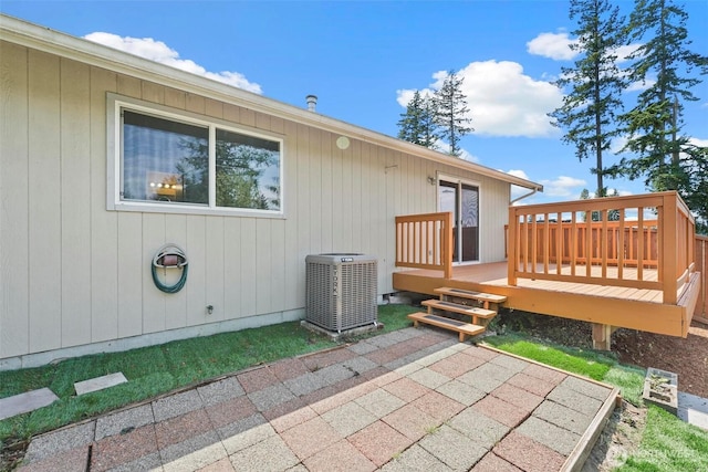 8506 8th Ct SE, Olympia, WA 98513 - rear view of house with a wooden deck and a patio