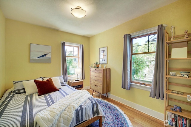 752 N 84th, Seattle, WA 98103 - bedroom with light wood finished floors and baseboards