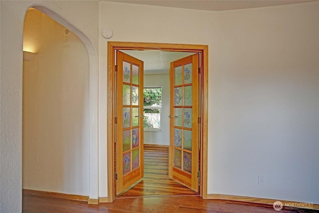 832 Margie Ann Dr, Camano Island, WA 98282 - hall featuring wood finished floors and arched walkways