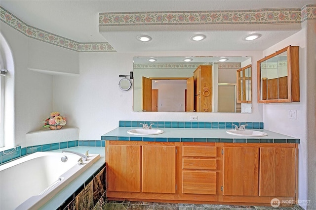 832 Margie Ann Dr, Camano Island, WA 98282 - full bath with double vanity, a garden tub, a stall shower, and recessed lighting