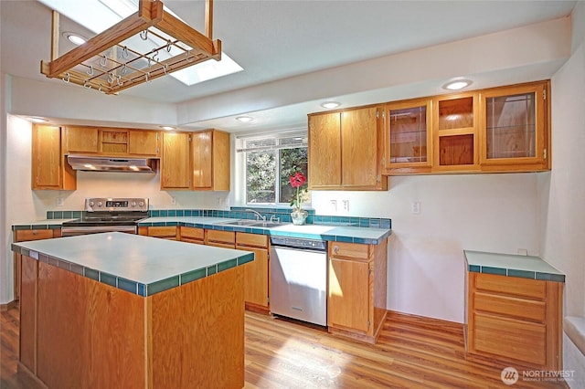 832 Margie Ann Dr, Camano Island, WA 98282 - kitchen featuring stainless steel appliances, tile counters, under cabinet range hood, and recessed lighting