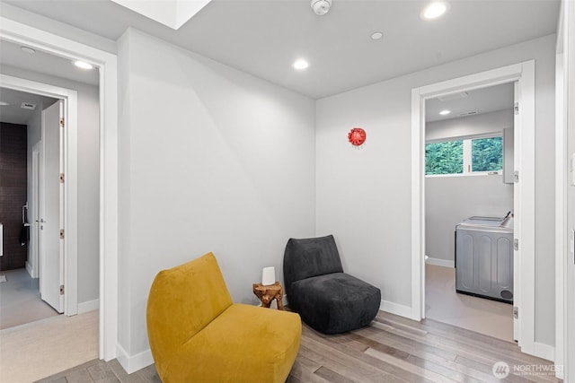 3108 92nd Ave NE, Clyde Hill, WA 98004 - living area with wood finished floors, recessed lighting, and a skylight