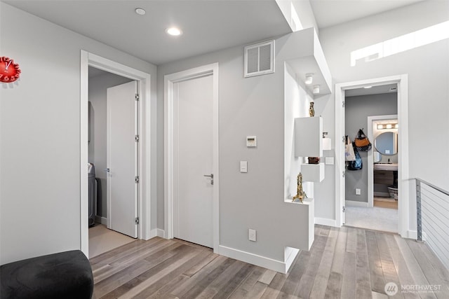 3108 92nd Ave NE, Clyde Hill, WA 98004 - hall with wood finished floors and recessed lighting