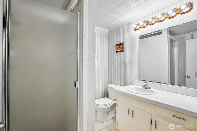 16906 13th Ave NW, Shoreline, WA 98177 - full bathroom featuring ornamental molding, vanity, an ornate ceiling, a stall shower, and tile patterned floors