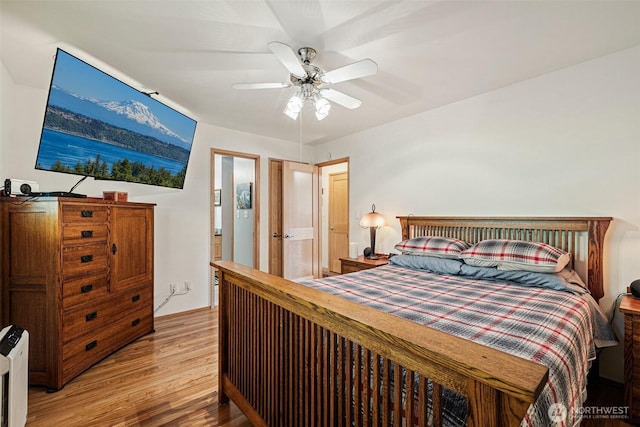 7139 Wright Ave SW, Seattle, WA 98136 - bedroom featuring light wood-style flooring and a ceiling fan