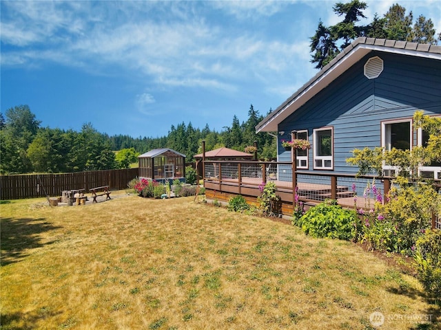 10 Davenhill Ln, Sequim, WA 98382 - view of yard featuring an exterior structure, an outdoor structure, and a deck