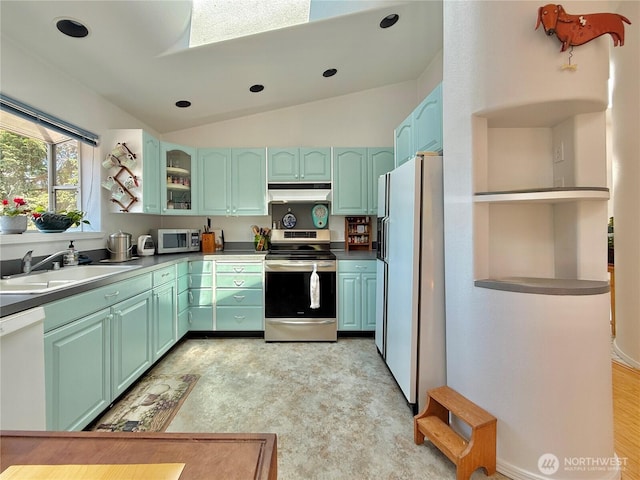 10 Davenhill Ln, Sequim, WA 98382 - kitchen with appliances with stainless steel finishes, lofted ceiling, open shelves, glass insert cabinets, and under cabinet range hood