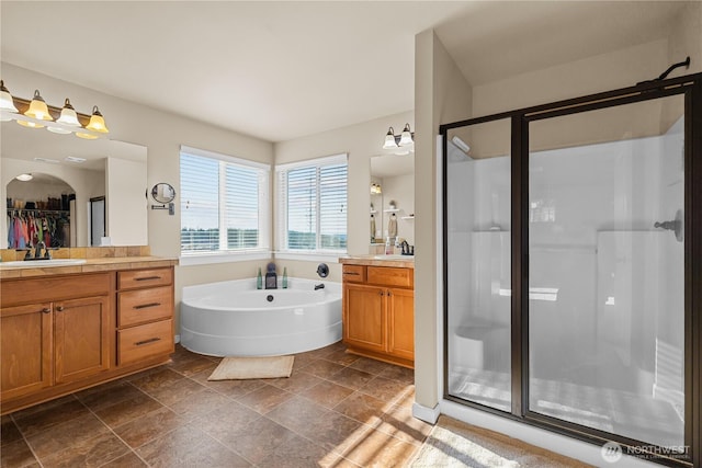 5539 Charlotte Ave SE, Auburn, WA 98092 - full bath featuring a shower stall, two vanities, and a bath