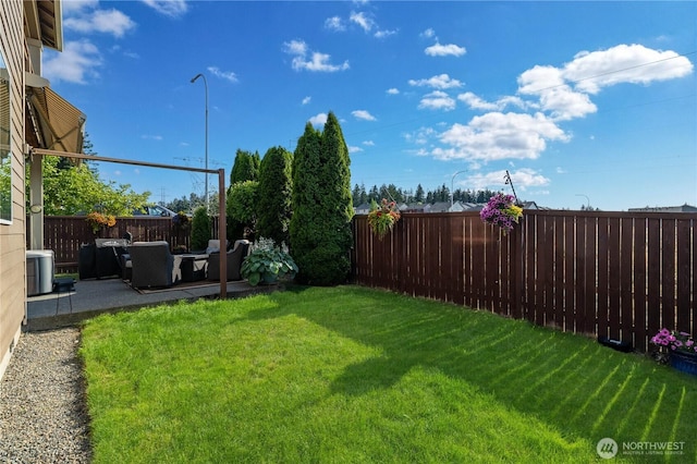 5539 Charlotte Ave SE, Auburn, WA 98092 - fenced backyard with a patio area and outdoor lounge area