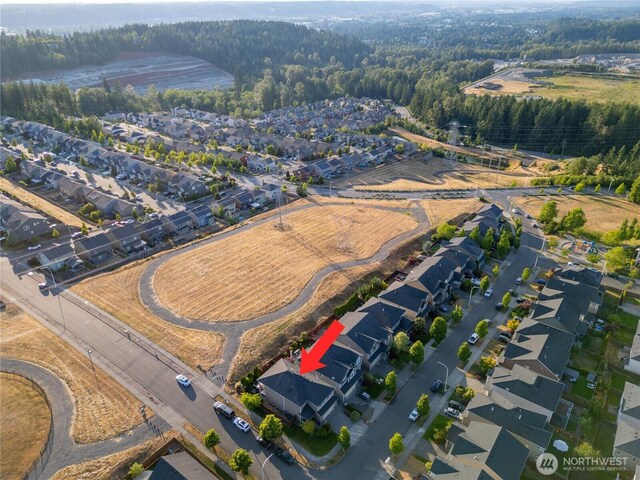 5539 Charlotte Ave SE, Auburn, WA 98092 - aerial view of property and surrounding area featuring a heavily wooded area and nearby suburban area